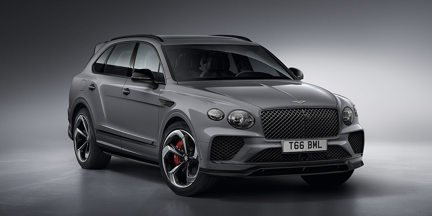 Bentley New Delhi Bentley Bentayga S in Cambrian Grey paint front three - quarter view with dark chrome matrix grille and featuring elliptical LED matrix headlights. 