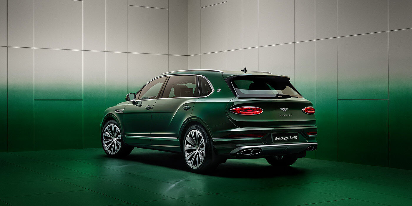 Bentley New Delhi Bentley Bentayga Extended Wheelbase SUV Rear three quarter view in Light Emerald green paint in green and grey room