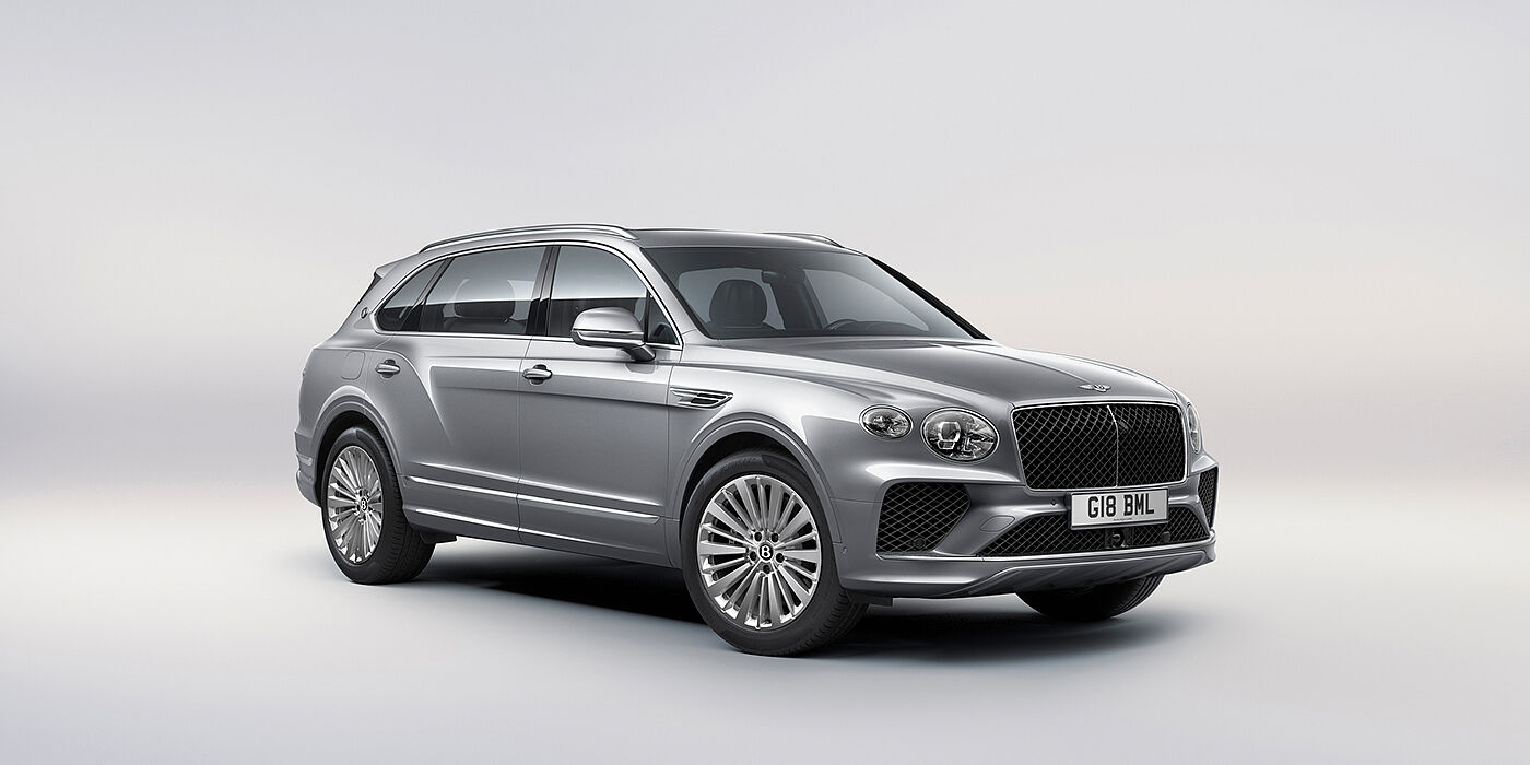 Bentley New Delhi Bentley Bentayga Extended Wheelbase luxury SUV front three quarter view in Moonbeam paint with 21 inch five spoke painted wheels