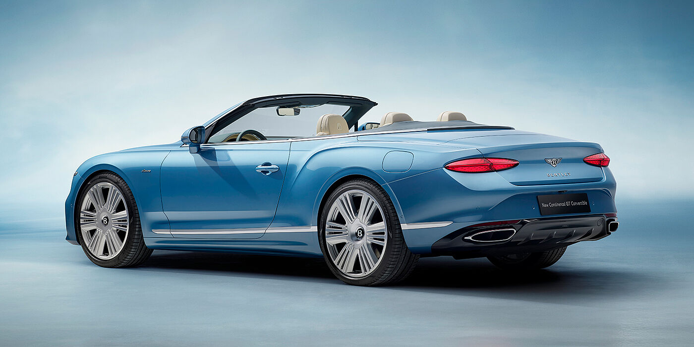 Bentley New Delhi New Bentley Continental GTC Azure convertible rear view in Light Windsor blue paint with 22 inch ten spoke wheels and chrome exterior details