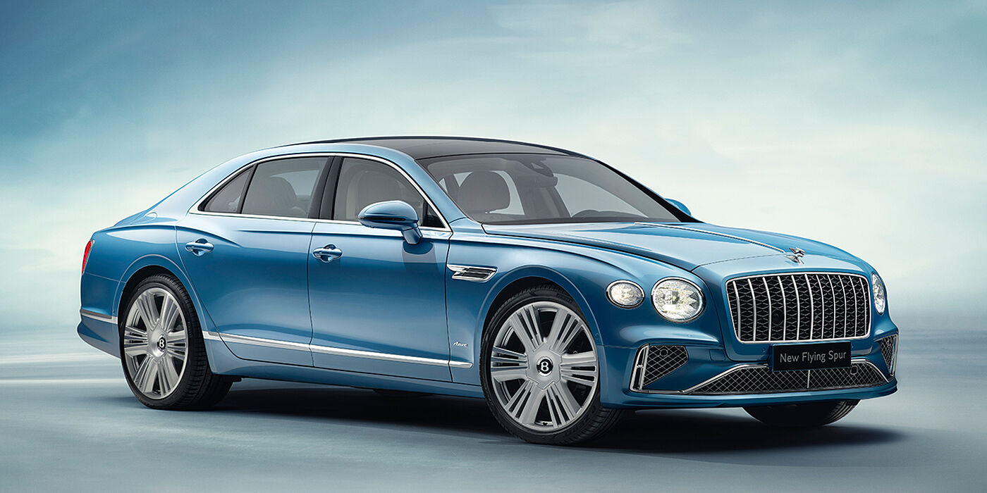Bentley New Delhi New Bentley Flying Spur Azure sedan front view in Light windsor blue by Mulliner paint with 22 inch Azure wheels and chrome exterior details