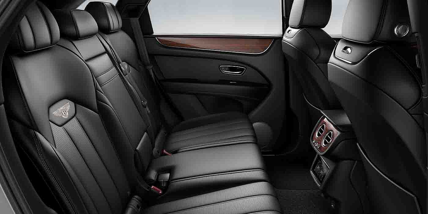 Bentley New Delhi Bentley Bentayga EWB interior view for rear passengers with Beluga black hide.